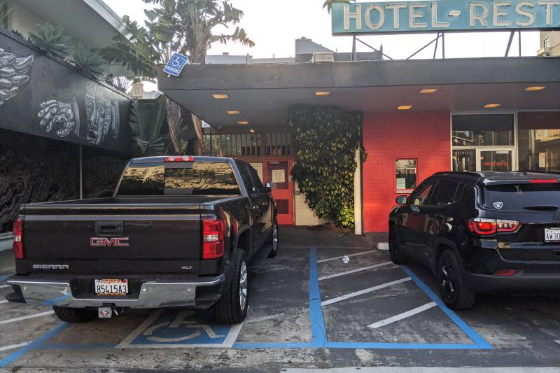 Hotel entrance with ADA accessible parking