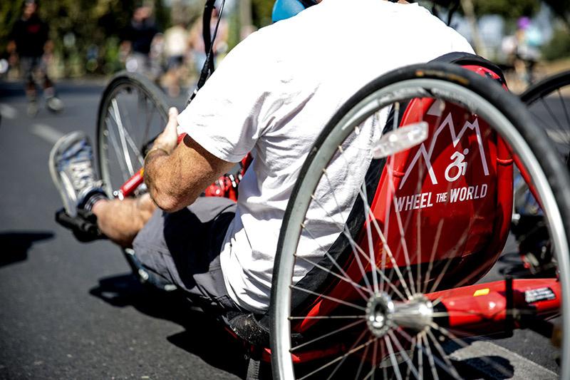 A tourist uses a Wheel the World handbike to visit Central Park