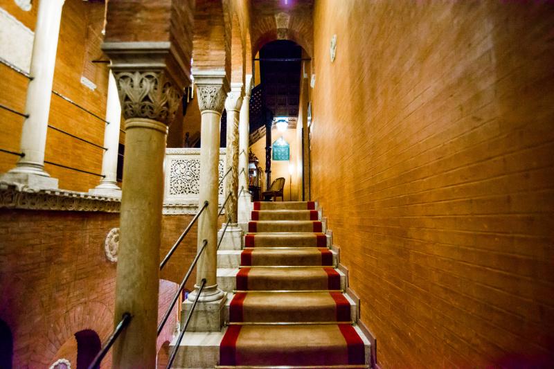 Ornate carpeted stairway